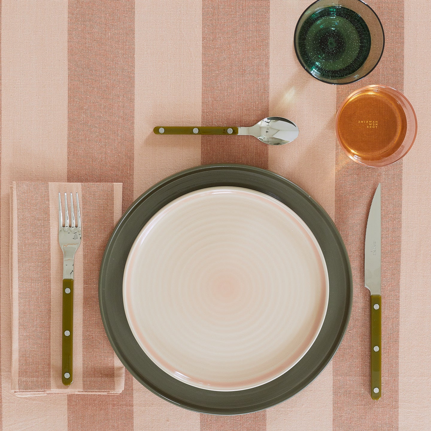 Placesetting on Essential Striped Tablecloth in Blush and Terracotta.