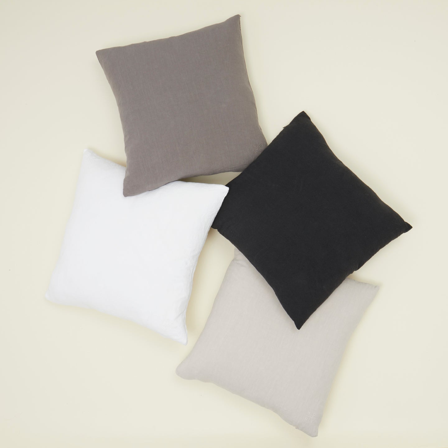 Four Simple Linen Euro Shams in various colors.