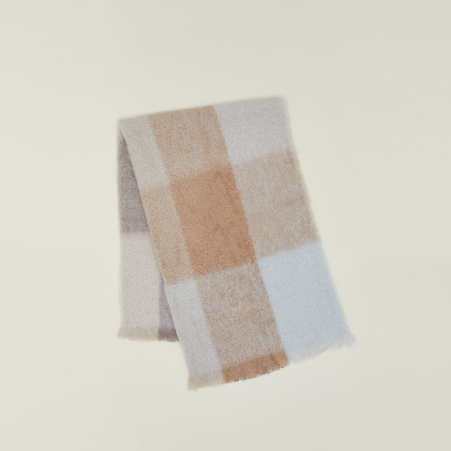 Exploded Plaid Mohair Throw in neutral.