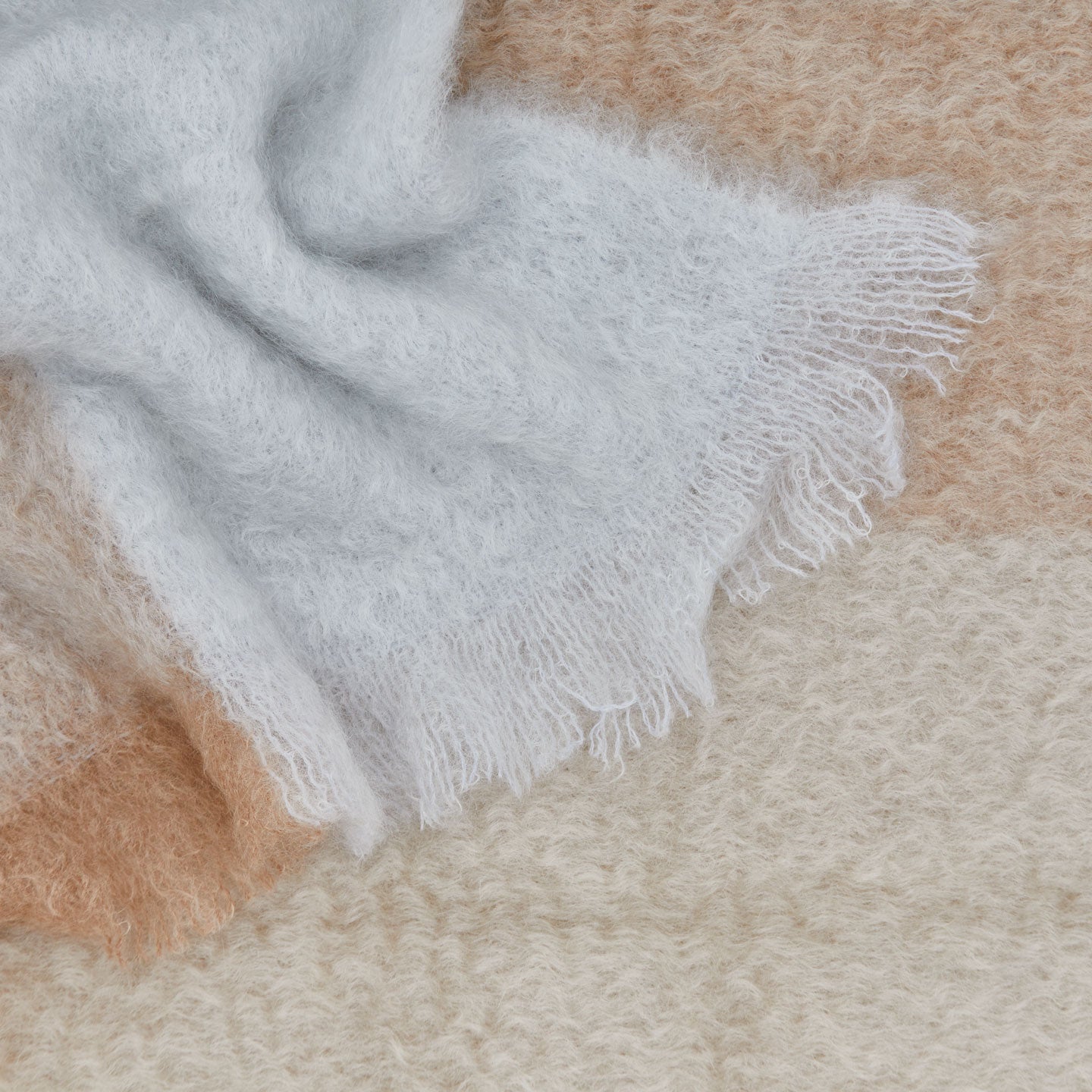Exploded Plaid Mohair Throw in neutral.