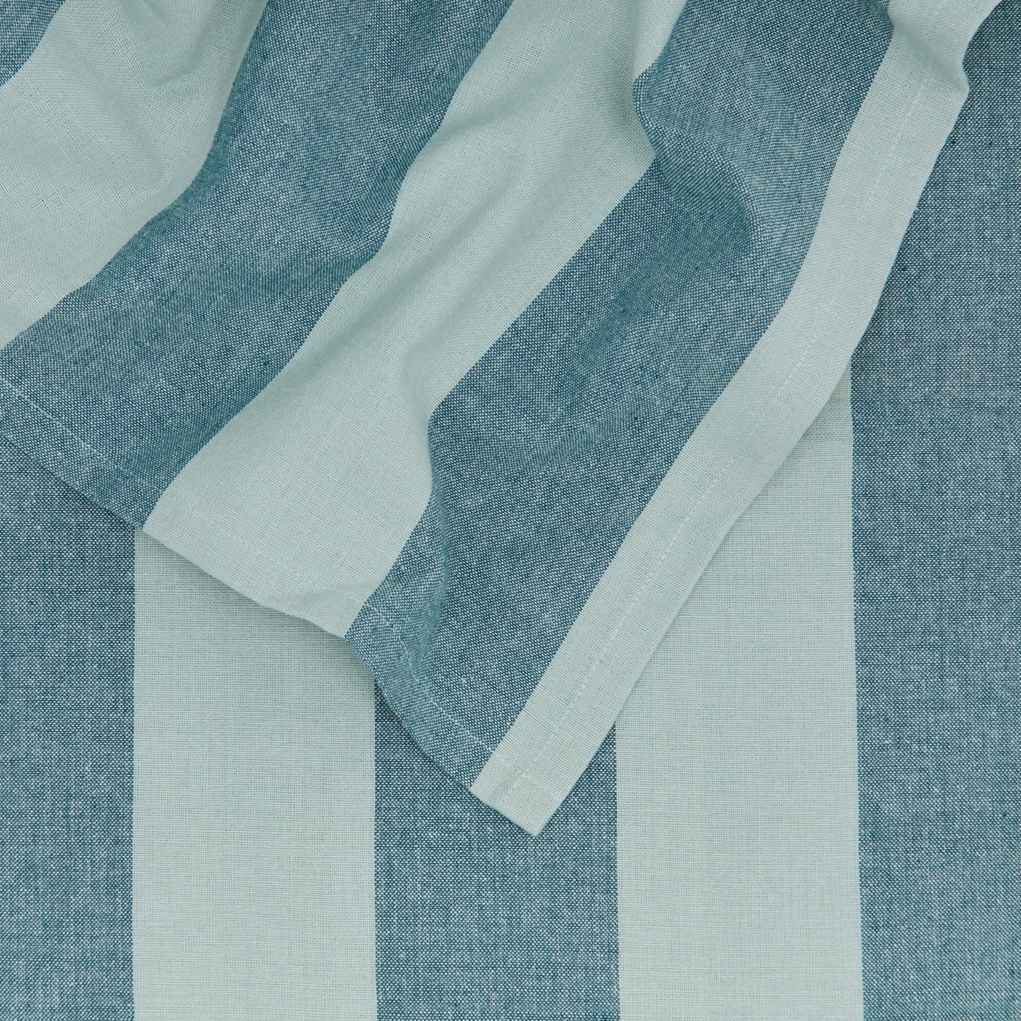 Close up of Essential Striped Tablecloth in Sky and Peacock.