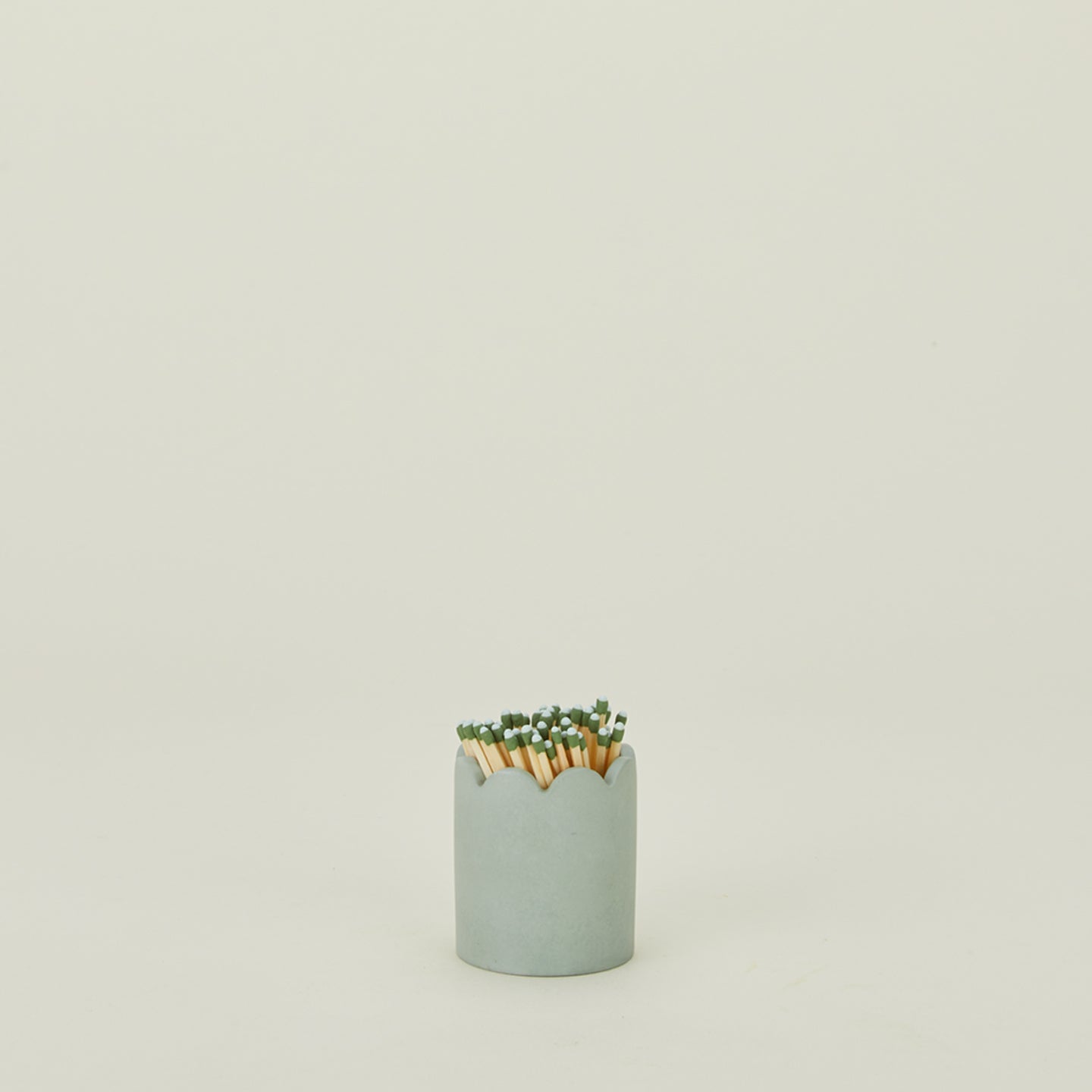 Scalloped match striker in mint green
