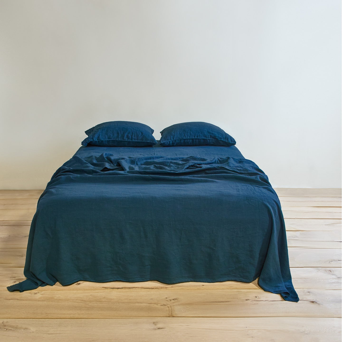 Simple linen bedding in peacock
