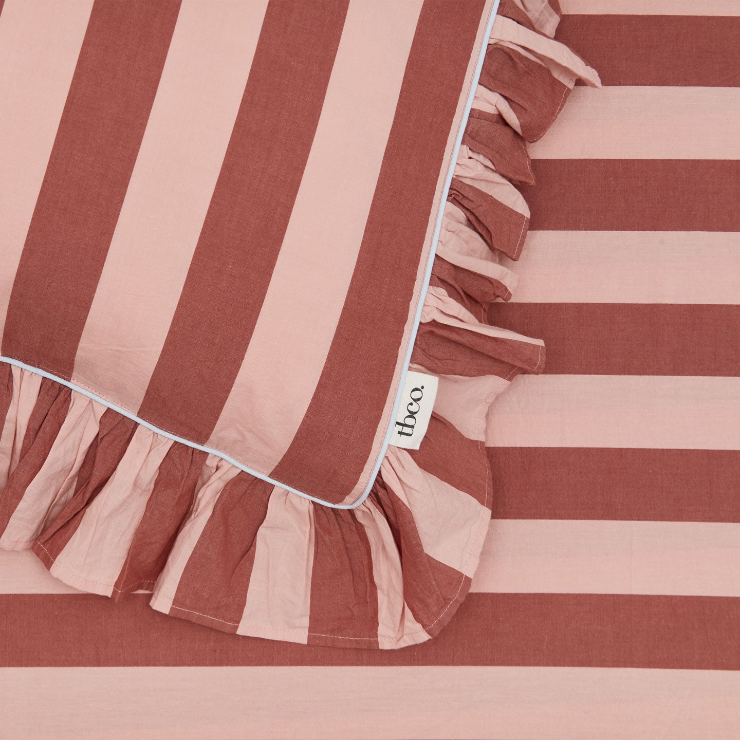 Blush and terracotta pillowcase detail